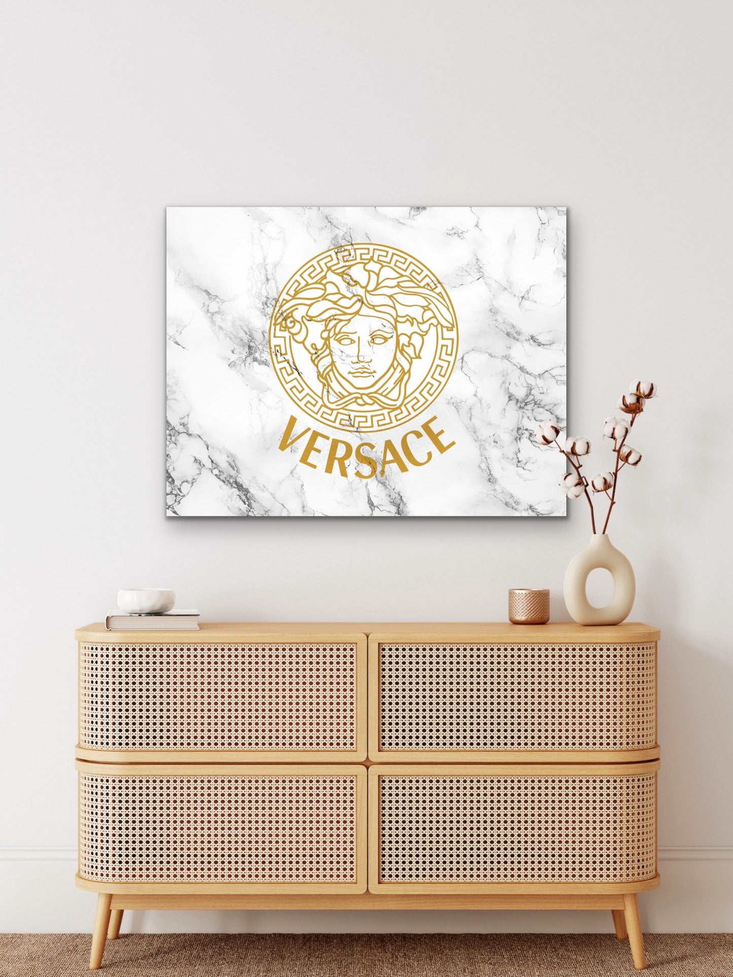 This luxurious product features a white marbled backdrop adorned with a golden logo for a classy appearance.